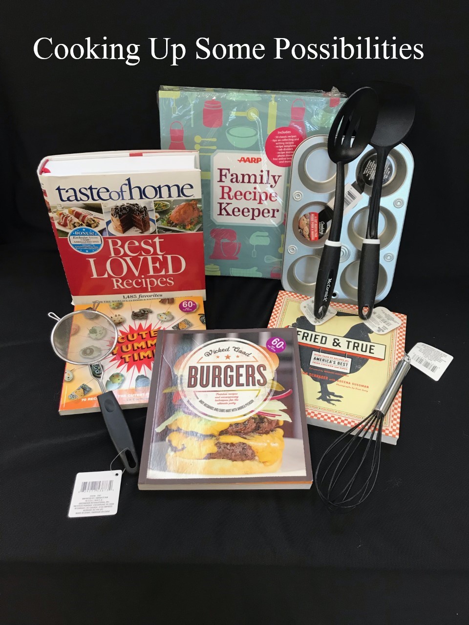 basket with cooking utensils and cookbooks