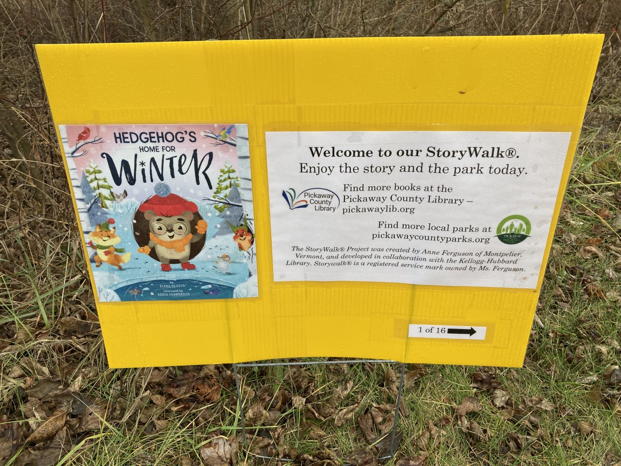 Yellow sign with Hedgehog book pages