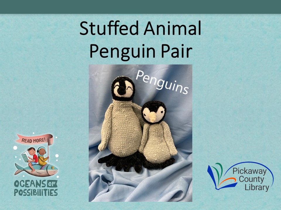 Pair of crocheted stuffed penguins
